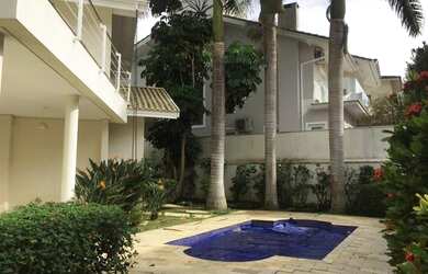 Imagem: A casa em condomínio possui 5 Dormitórios, 5 Banheiros, 5