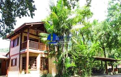 Imagem: A casa à venda possui 5 Dormitórios, 1 Banheiro, 1 Vaga na