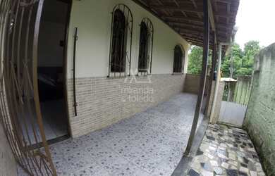 Imagem: A casa possui 5 Dormitórios, 2 Banheiros, 1 Vaga na garagem