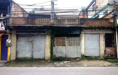 Imagem: A casa possui 3 Dormitórios, 1 Banheiro, 1 Vaga na garagem