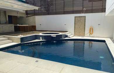 Imagem: A casa em condomínio possui 4 Dormitórios, 4 Banheiros, 5