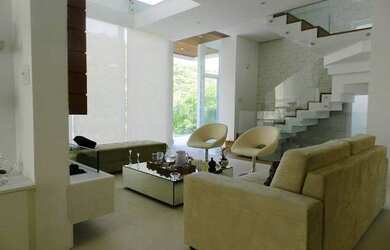 Imagem: A casa em condomínio possui 4 Dormitórios, 5 Banheiros, 4