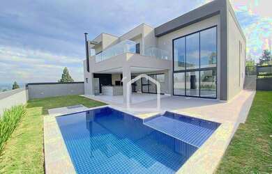 Imagem: A casa em condomínio possui 4 Dormitórios, 5 Banheiros, 5