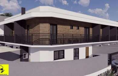 Imagem: A casa possui 3 Dormitórios, 2 Banheiros, 2 Vagas na garagem