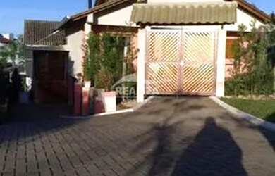 Imagem: A casa em condomínio possui 3 Dormitórios, 3 Banheiros, 5