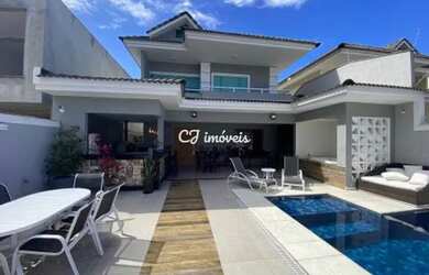 Imagem: A casa em condomínio possui 4 Dormitórios, 5 Banheiros, 4