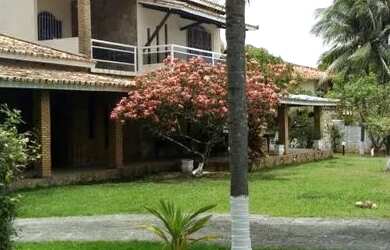 Imagem: A casa possui 4 Dormitórios, 1 Banheiro, 5 Vagas na garagem