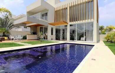 Imagem: A casa possui 5 Dormitórios, 5 Banheiros, 5 Vagas na garagem