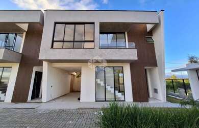 Imagem: A casa em condomínio possui 3 Dormitórios, 3 Banheiros, 1