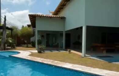 Imagem: A casa possui 3 Dormitórios, 4 Banheiros, 4 Vagas na garagem