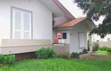 Imagem: A casa possui 5 Dormitórios, 3 Banheiros, 2 Vagas na garagem