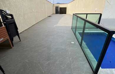 Imagem: A casa possui Acomodam 30 pessoas e está localizado em Vila