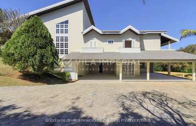 Imagem: A casa em condomínio possui 5 Dormitórios, 5 Banheiros, 5