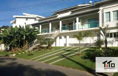 Imagem: A casa em condomínio possui 5 Dormitórios, 5 Banheiros, 5