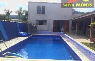 Imagem: A casa possui 2 Dormitórios, 1 Banheiro, 2 Vagas na garagem