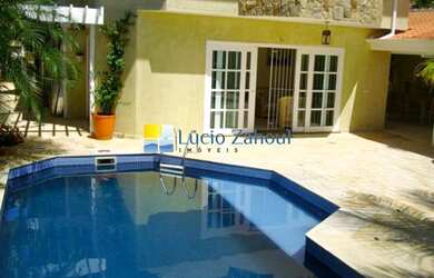 Imagem: A casa à venda possui 4 Dormitórios, 5 Banheiros, 4 Vagas