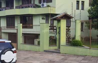 Imagem: A casa possui 4 Dormitórios, 2 Banheiros, 2 Vagas na garagem