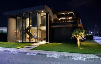 Imagem: A casa em condomínio possui 4 Dormitórios, 5 Banheiros, 4