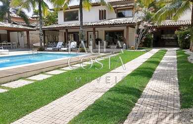 Imagem: A casa em condomínio possui 5 Dormitórios, 5 Banheiros, 5