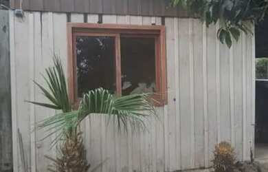 Imagem 1: Terreno com casa mista