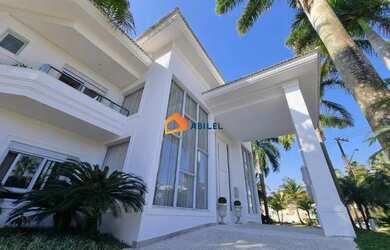 Imagem: A casa possui 5 Dormitórios, 5 Banheiros, 5 Vagas na garagem