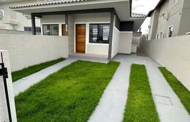 Imagem: A casa possui 3 Dormitórios, 1 Banheiro, 1 Vaga na garagem