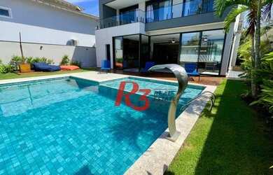 Imagem: A casa possui 5 Dormitórios, 5 Banheiros, 4 Vagas na garagem