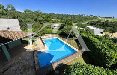 Imagem: A casa em condomínio possui 4 Dormitórios, 5 Banheiros, 2