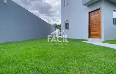 Imagem: A casa possui 3 Dormitórios, 3 Banheiros, 2 Vagas na garagem