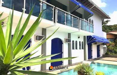 Imagem: A casa em condomínio à venda possui 5 Dormitórios, 5 Banheiros