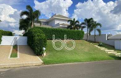 Imagem: A casa em condomínio possui 4 Dormitórios, 5 Banheiros, 4