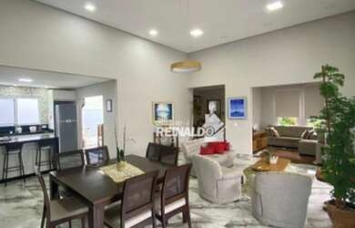 Imagem: A casa possui 4 Dormitórios, 5 Banheiros, 3 Vagas na garagem