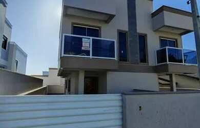 Imagem: A casa possui 3 Dormitórios, 2 Banheiros, 1 Vaga na garagem