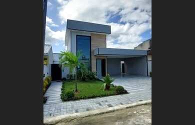 Imagem: A casa possui 3 Dormitórios, 1 Banheiro, 2 Vagas na garagem