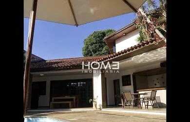 Imagem: A casa possui 5 Dormitórios, 5 Banheiros, 3 Vagas na garagem