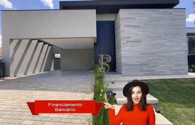 Imagem: A casa possui 3 Dormitórios, 3 Banheiros, 4 Vagas na garagem