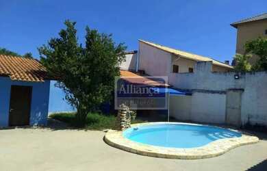 Imagem: A casa possui 3 Dormitórios, 3 Banheiros, 5 Vagas na garagem