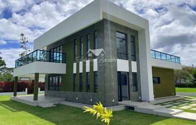 Imagem: A casa em condomínio possui 4 Dormitórios, 5 Banheiros, 3