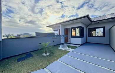 Imagem: A casa possui 2 Dormitórios, 2 Banheiros, 1 Vaga na garagem