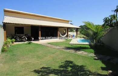 Imagem: A casa possui 2 Dormitórios, 1 Banheiro, 2 Vagas na garagem