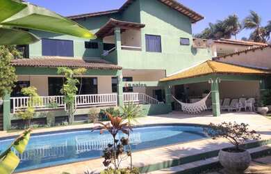 Imagem: A casa em condomínio possui 5 Dormitórios, 5 Banheiros, 5