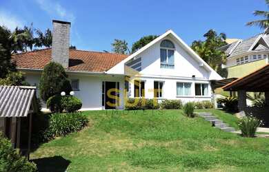 Imagem: A casa possui 3 Dormitórios, 5 Banheiros, 5 Vagas na garagem