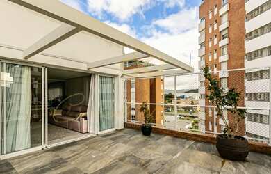 Imagem: O apartamento possui 3 Dormitórios, 4 Banheiros, 2 Vagas na