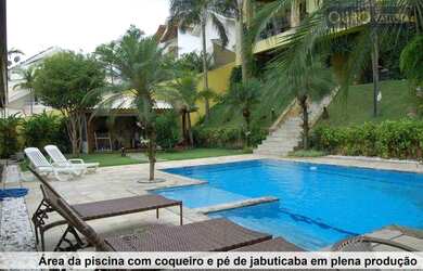 Imagem: A casa em condomínio possui 5 Dormitórios, 5 Banheiros, 4