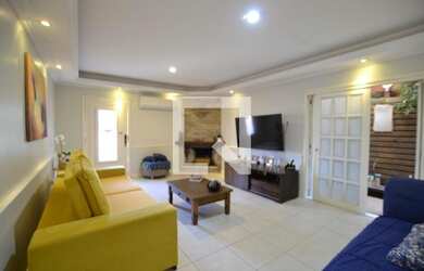 Imagem: A casa possui 5 Dormitórios, 4 Banheiros, 4 Vagas na garagem