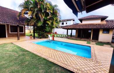 Imagem: A casa possui 3 Dormitórios, 3 Banheiros, 3 Vagas na garagem