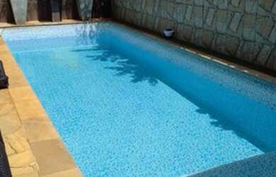 Imagem: A casa possui 2 Dormitórios, 3 Banheiros, 2 Vagas na garagem