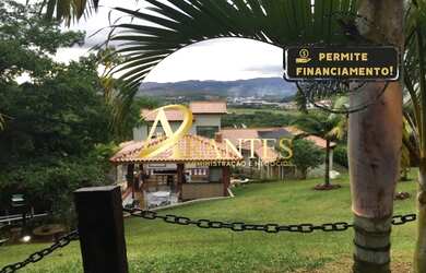 Imagem: A casa em condomínio possui 3 Dormitórios, 3 Banheiros e 1000m²