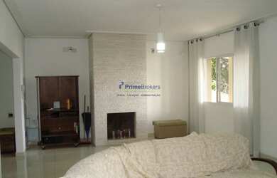 Imagem: A casa possui 4 Dormitórios, 4 Banheiros, 5 Vagas na garagem