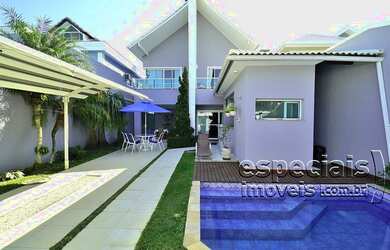 Imagem: A casa em condomínio possui 4 Dormitórios, 5 Banheiros, 2